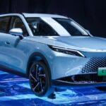 Объявление о новом кроссовере Omoda C7 и его гибридной версии