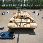 Испытания безопасности аккумуляторов электромобиля Geely EX5: выдержка под нагрузкой танка