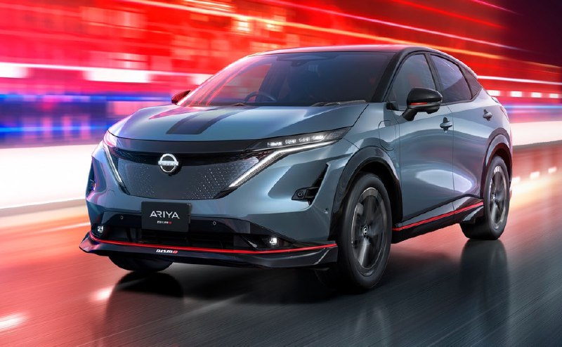 Nissan готовит к запуску обновленную AriyaВнешние обновления включают переднюю панель в цвет кузова, новые светодиодные ходовые огни и 20-дюймовые колеса нового дизайна. Nissan готовит к запуску обновленную AriyaВнешние обновления включают переднюю панель в цвет кузова, новые светодиодные ходовые огни и 20-дюймовые колеса нового дизайна.