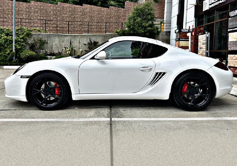 Обзор Porsche Cayman 2010: надежный и динамичный спорткар