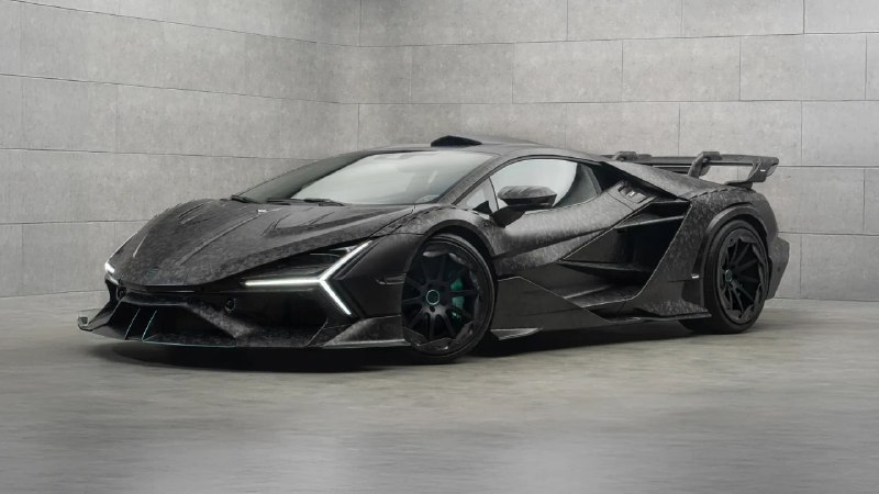Уникальный гиперкар Lamborghini Revuelto в исполнении Mansory: Carbonado X с карбоновым кузовом и улучшенной мощностью Уникальный гиперкар Lamborghini Revuelto в исполнении Mansory: Carbonado X с карбоновым кузовом и улучшенной мощностью